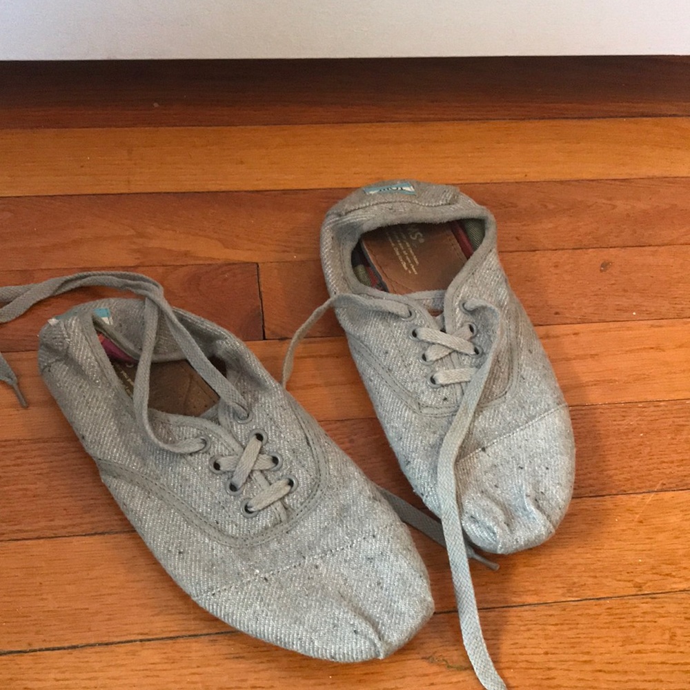 Grey lace up Tom’s